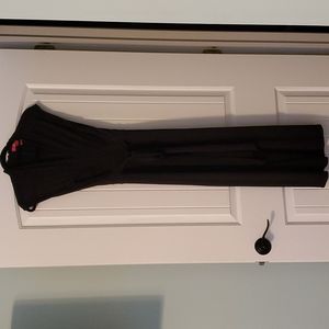 Black v neck jumpsuit.  Wide leg.  With pleat look.